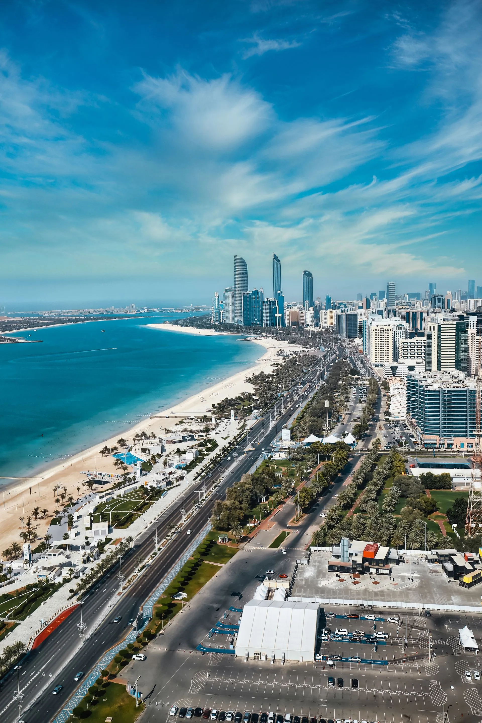 Aerial view of Abu Dhabi's Corniche skyline and coastline